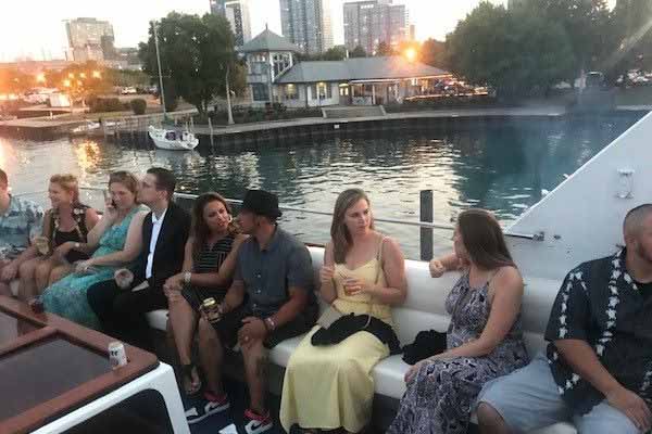 A group of people enjoying their Chicago boat rental