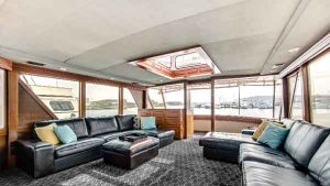 Lower deck of the Sophisticated Lady yacht has couches